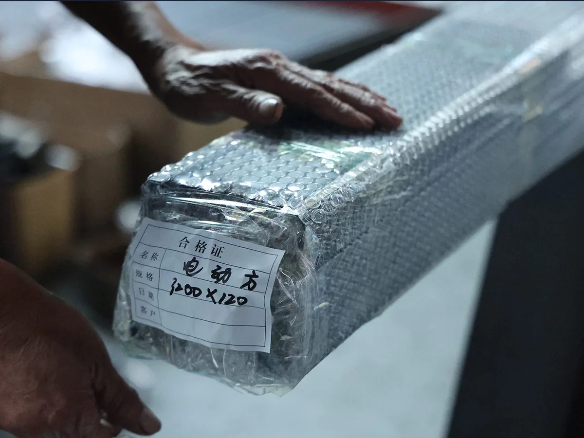 A tooling component with an inspection label and protective wrapping
